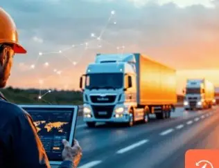 Logistics specialist monitoring trucks on the road